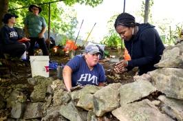 Kabria Baumgartner and Meghan Howey at the dig site of what archeologists believe is the home of King Pompey.